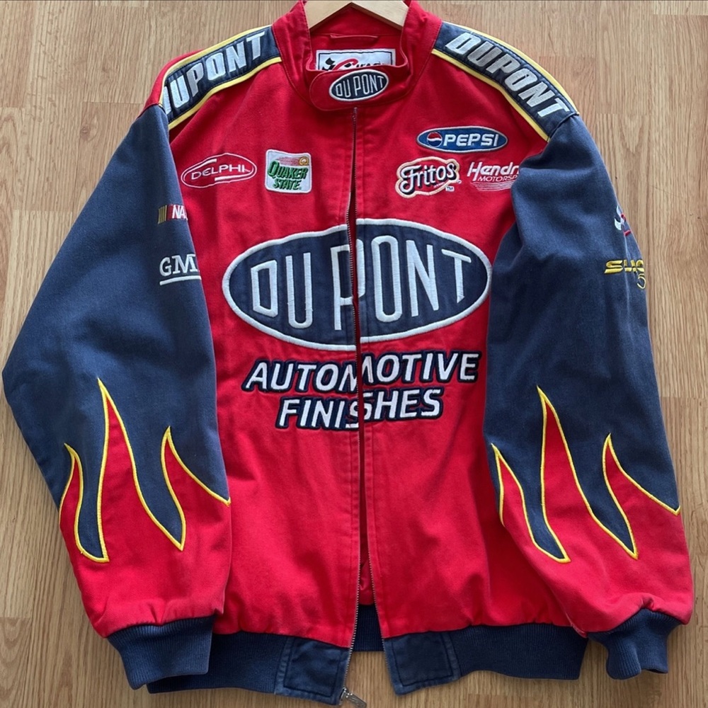 RED FLAMING NASCAR JACKET SIZE MEDIUM. Fit perfectly oversized
